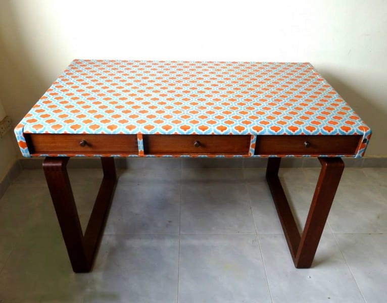 Upcycled vintage wooden furniture hand-painted in vivid retro designs at Art from Junk Singapore