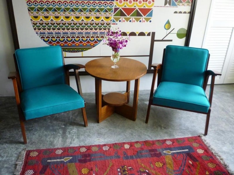 Curated vintage furniture pieces displayed at Mad About Vintage store in Singapore