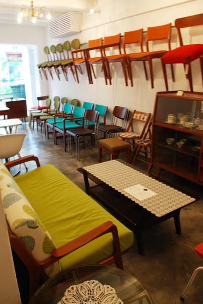 Vintage chairs and side tables after professional restoration at ReStore Living Singapore