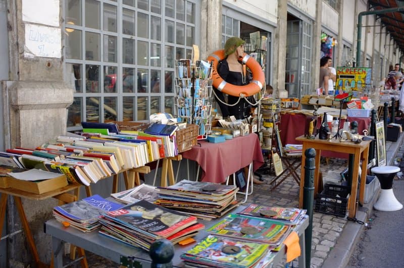 Browsing antiques and bric-a-brac at the Lisbon Thieves Market