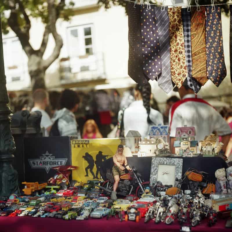 Vendor at Feira da Ladra Lisbon flea market