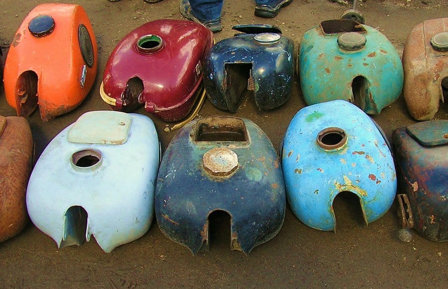 Piles of bicycle parts and components for sale at the Latgale Tirgus flea market in Riga