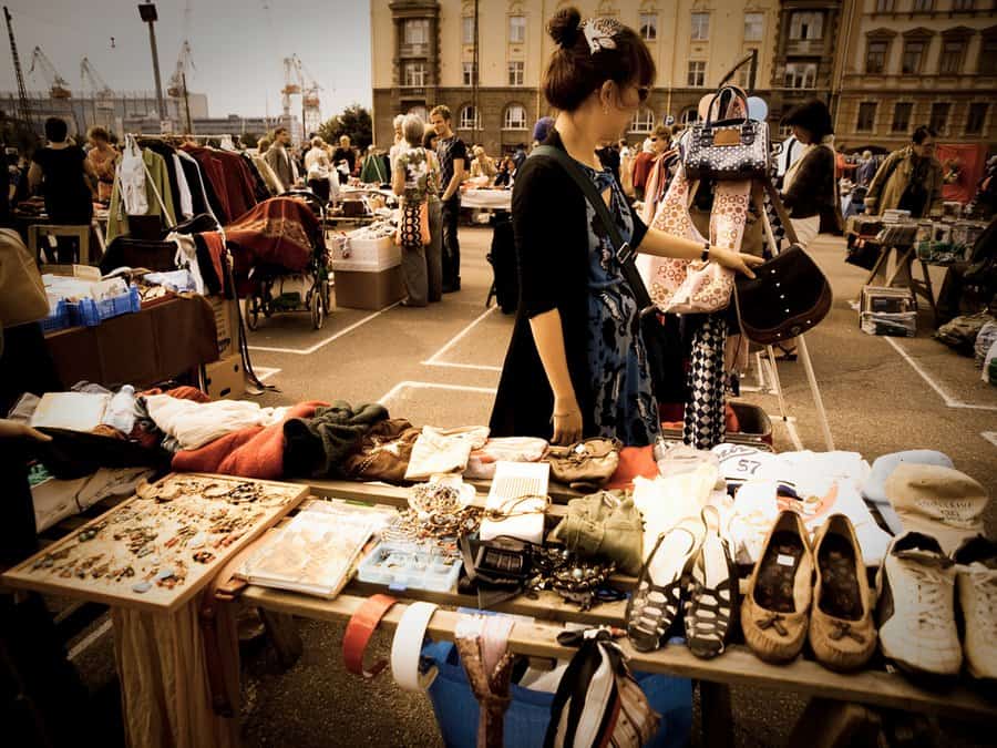 Hietalahdentori flea market Helsinki browsers at vendor stalls with vintage items
