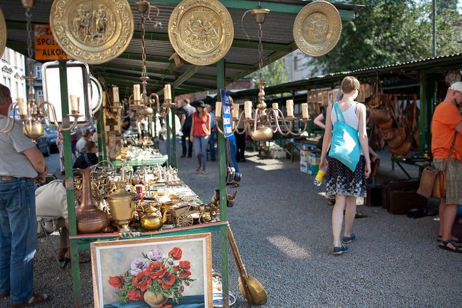 Antique stalls surrounding the central rotunda at Plac Nowy flea market in Krakow's Kazimierz quarter