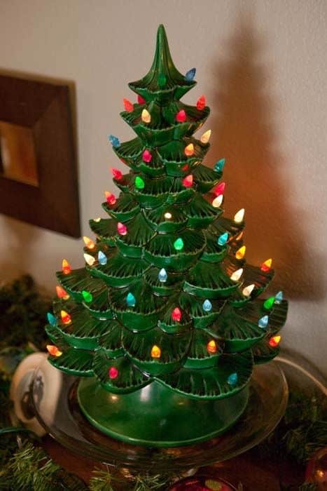 Vintage ceramic tabletop Christmas tree in pale green with coloured decorations
