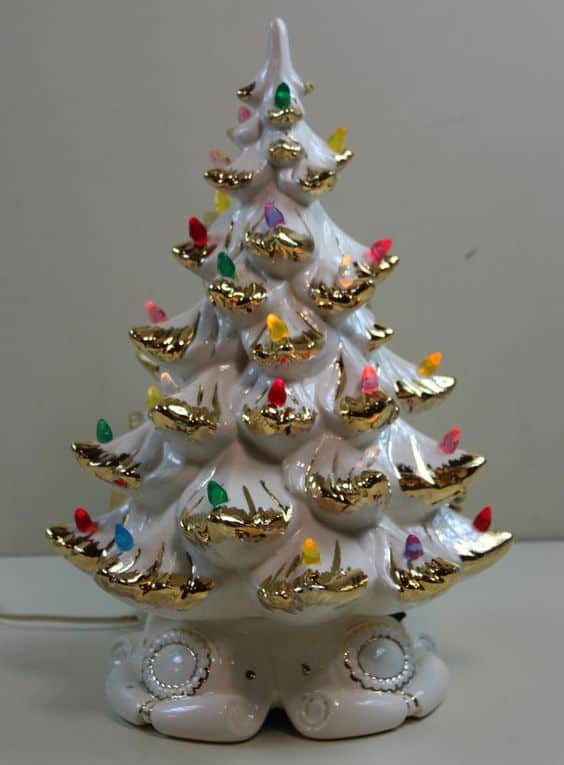 Green ceramic tabletop Christmas tree with coloured light-up bulbs from the 1970s