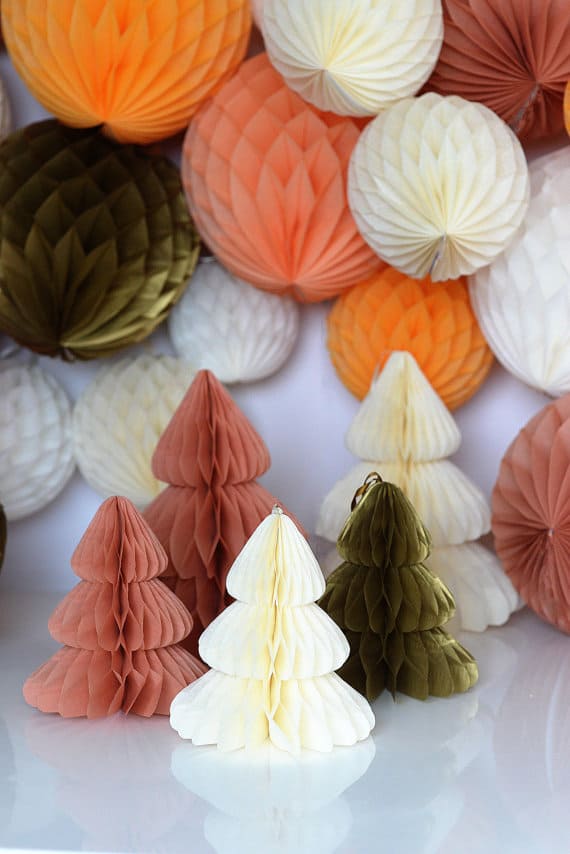 Vintage-style paper honeycomb ball decorations in festive green and red