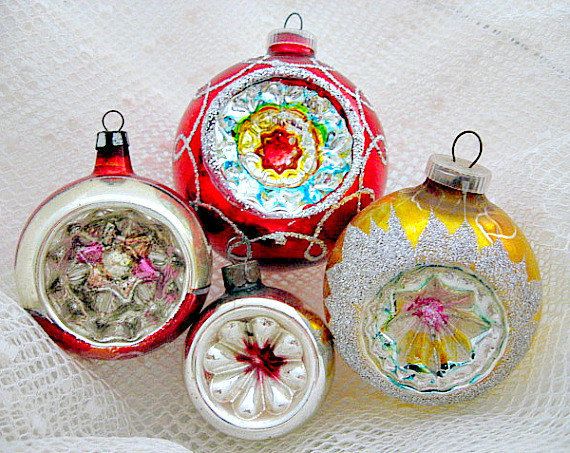 Close-up of vintage indented glass Christmas baubles showing dimpled reflective texture